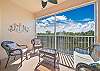 The screened in balcony offers a beautiful sunset lakeview