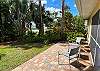 A patio is added behind the lanai for additional seating with beautiful lake view.