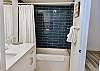New remodeled guest guest bathroom with a shower-tub combo