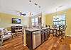 fully equipped open kitchen with breakfast bar and breakfast nook