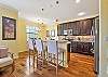 fully equipped open kitchen with breakfast bar and breakfast nook