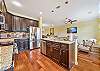 fully equipped open kitchen with breakfast bar and breakfast nook