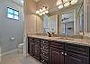 Dual sinks in the en-suite bathroom