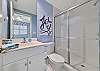 A spacious shower in the en-suite bathroom
