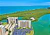 This unit is located on the 8th floor in building two of Vanderbilt Surf Colony and offers views of Delnor-Wiggins State Park and the Gulf of Mexico from the large corner balcony