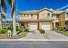 Corner townhome in the  gated community of Heatherstone at Rookery Pointe in Estero