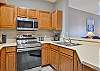 Fully equipped kitchen with dining area