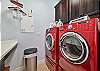 Laundry room with sink, washer and dryer