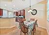 Breakfast nook off the kitchen overlooking the pool