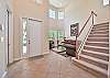 The spacious two-story entry welcomes you to this home