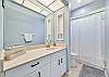 A shower-tub combo in the guest bathroom