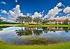 Gorgeous view from this top floor corner condo in the gated community of Bonita Fairways.