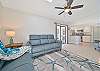 Family room with TV. Sliding door to the pool area