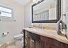 A shower-tub combo in the guest bathroom