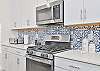 Fully equipped kitchen with gas cooktop