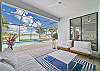 Very comfortable teak seating furniture in the covered lanai. 