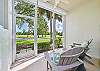 The screened in patio offers a beautiful view overlooking the Green