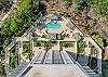 The Antiqua pool and walkway to the pedestrian gate at Bluebill Ave for beach access