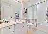 Guest bathroom with shower-tub combo