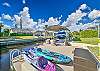 Cape Coral pool home with private dock. The canal offers River & Gulf access. Kayaks size M and L to use with waiver. Boat excluded