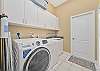 Fully equipped kitchen and laundry with washer and dryer and garage access