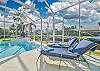 One of the many lounge areas on the pool deck. Private heated pool with outdoor shower