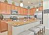 Fully equipped kitchen with breakfast bar