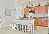 Fully equipped kitchen with breakfast bar