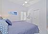 A king size bed in the third bedroom