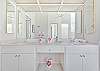 Dual sinks in the en-suite primary bathroom