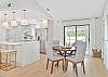 Dining area and kitchen with island seating