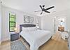 The primary suite is equipped with a king size bed and smart TV