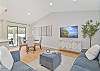 Family room with spacious sectional seating and smart TV