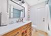A shower-tub combo in the guest bathroom