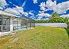 Spacious yard and screened in pool area