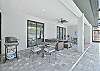 Covered outdoor seating & dining areas with smart TV & BBQ