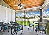 The screened in corner balcony with lake and golf course view allows a nice breeze