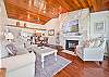The fireplace makes a stunning focal point in the living area