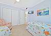 Two twin beds and smart TV in the third bedroom