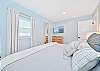 The second guest bedroom (downstairs) is equipped with a king bed and smart TV