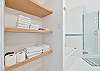 Dual sinks, a shower and separate tub in the upstairs primary bathroom