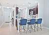 Fully equipped kitchen with breakfast bar