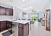 Fully equipped kitchen with breakfast bar