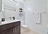 A shower-tub combo in the guest bathroom