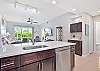Fully equipped kitchen with breakfast bar