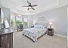 Primary suite with queen size bed and smart TV
