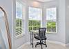 The bay window offers a beautiful view from the office nook