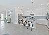 Fully equipped kitchen with island seating.