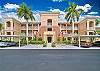 First floor condo with one assigned covered parking and additional guest parking
