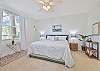 A king bed and smart TV and cable in the primary bedroom